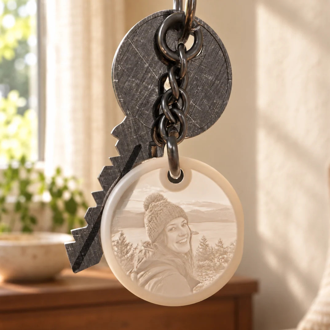 Glimery round photo keychain with a portrait photo, backlit to reveal the photo.