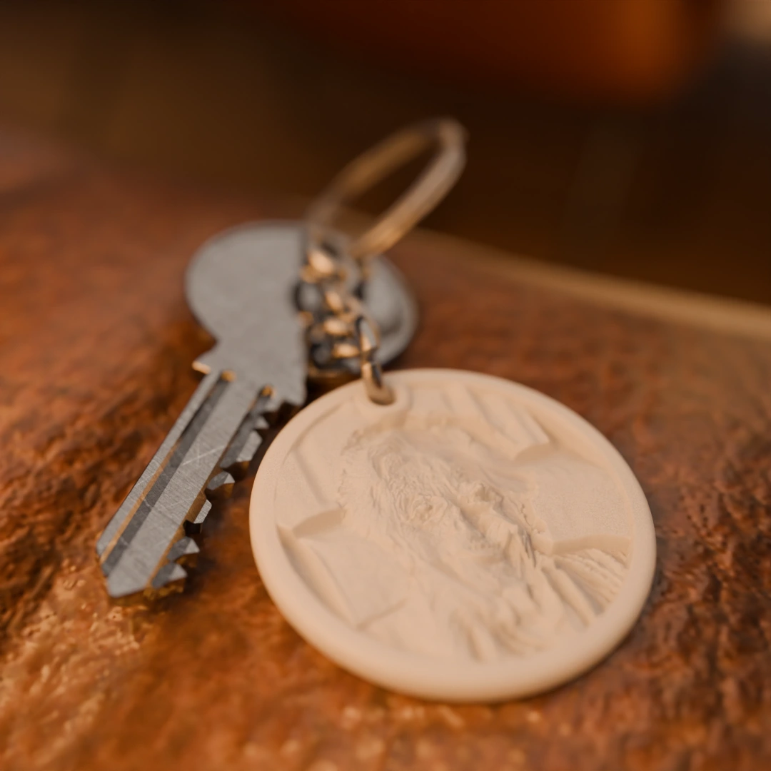 Glimery round photo keychain with a portrait of an older woman, lying on a table, showing the relief of the photo.